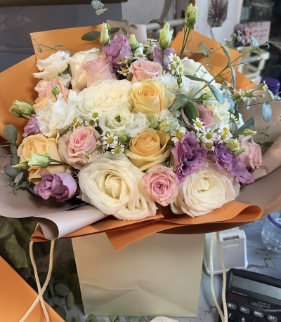 casural roses - pink peach white roses with lialic lisiantus ,any ocasions